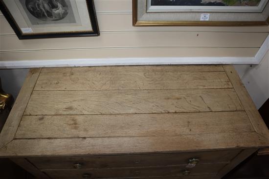 A 19th century French bleached oak commode